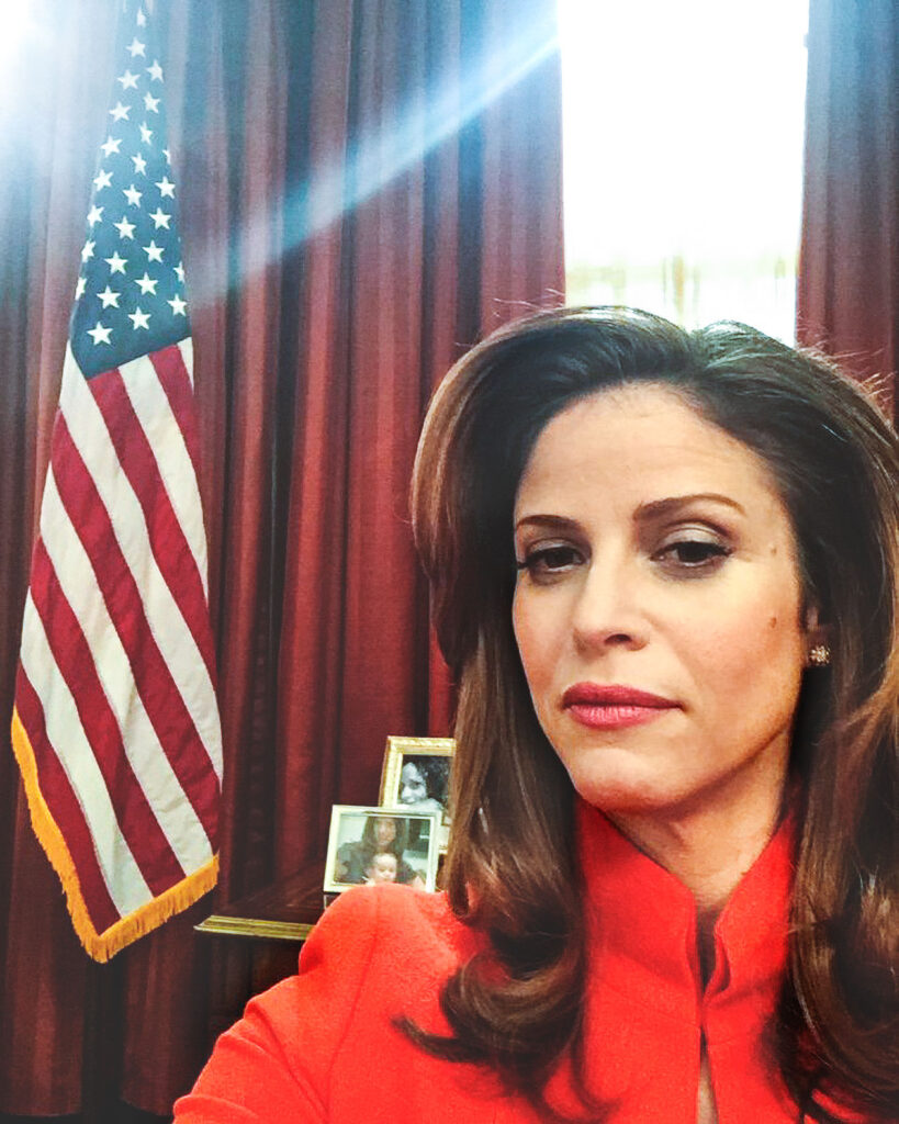 A selfie of Andrea Savage in a set of the Oval Office