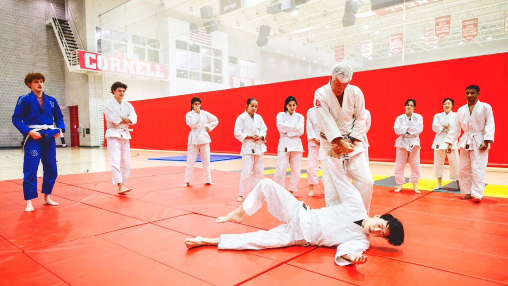 Students in Kevin Seaman's Brazilian jiu-jitsu class in Bartels Hall