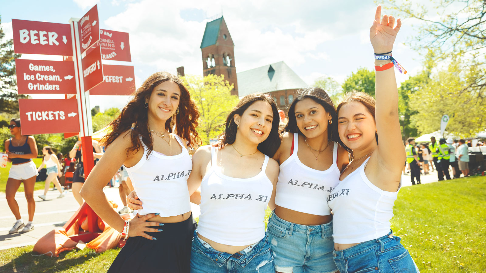 Student members of Alpha Xi pose on Ho Plaza during Slope Day and Slope Fest events