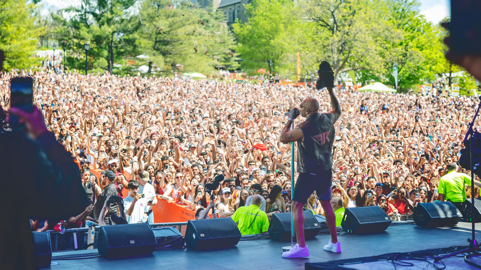 Flo Rida performs in front of a packed crowd at Slope Day 2024