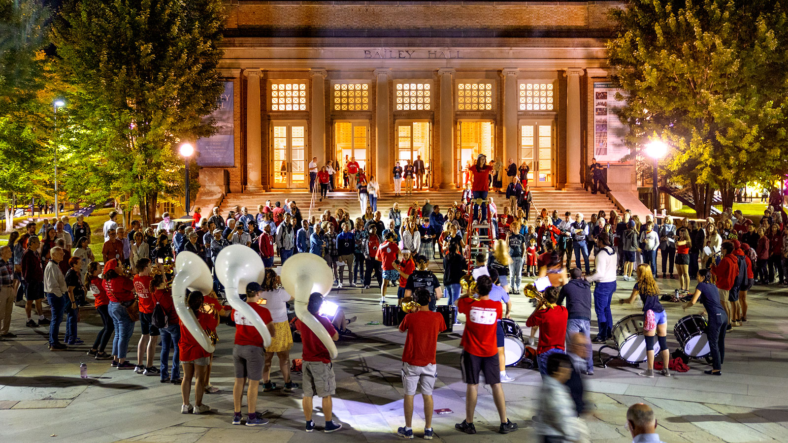Members of the Big Red band play outside Bailey Hall during Reunion 2024