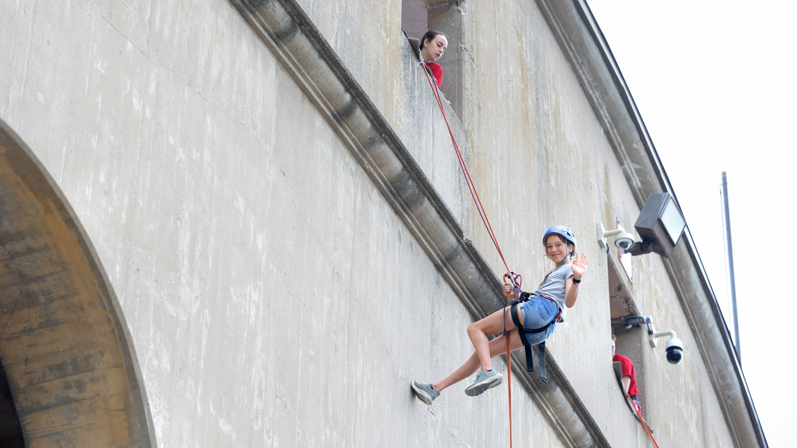 Cornellians and their families try out rappelling at Schoelkopff for Reunion 2024