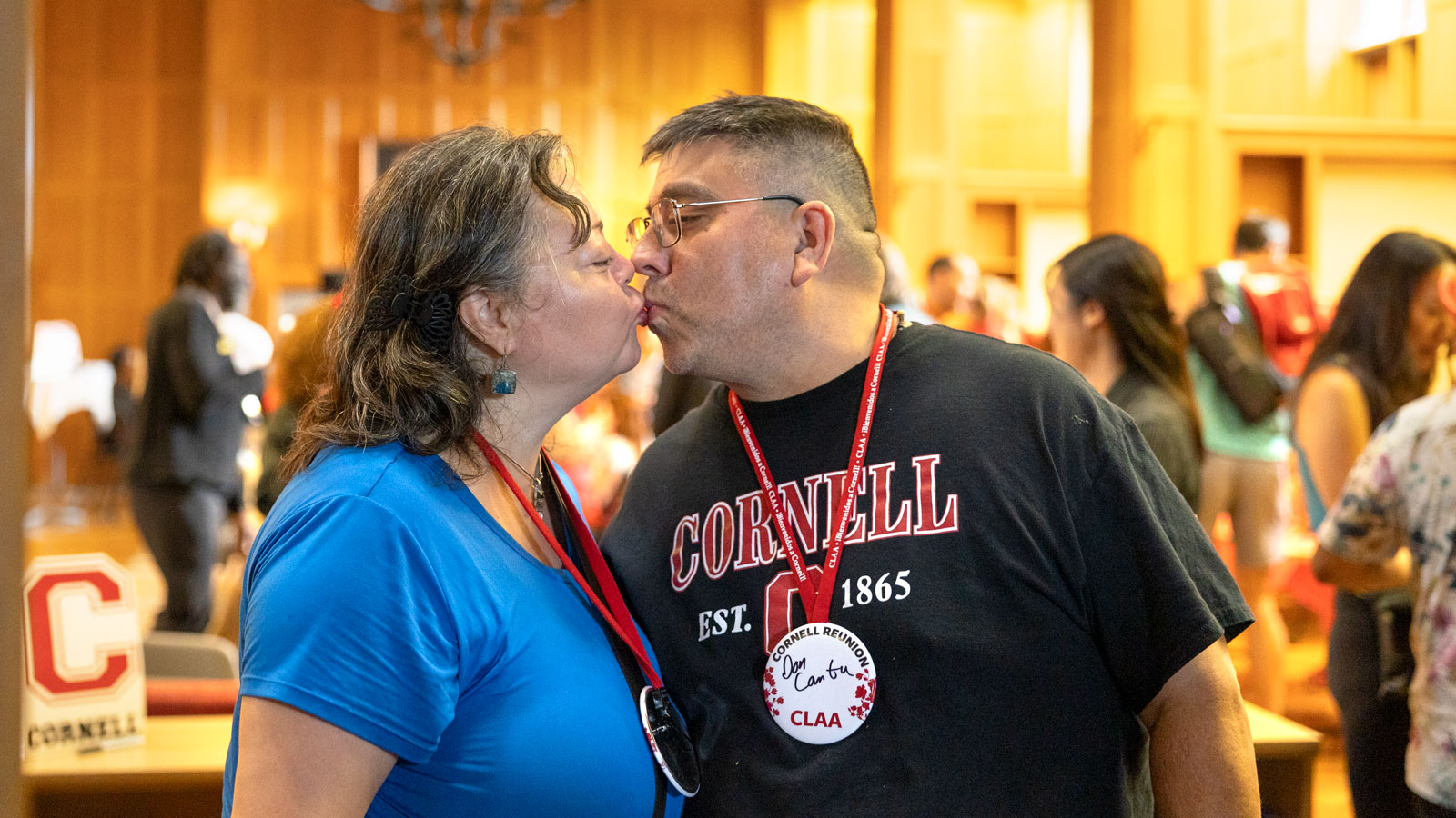 A Cornellian couple kisses at Willard Straight Hall for the Mix and Mingle event at Reunion 2024