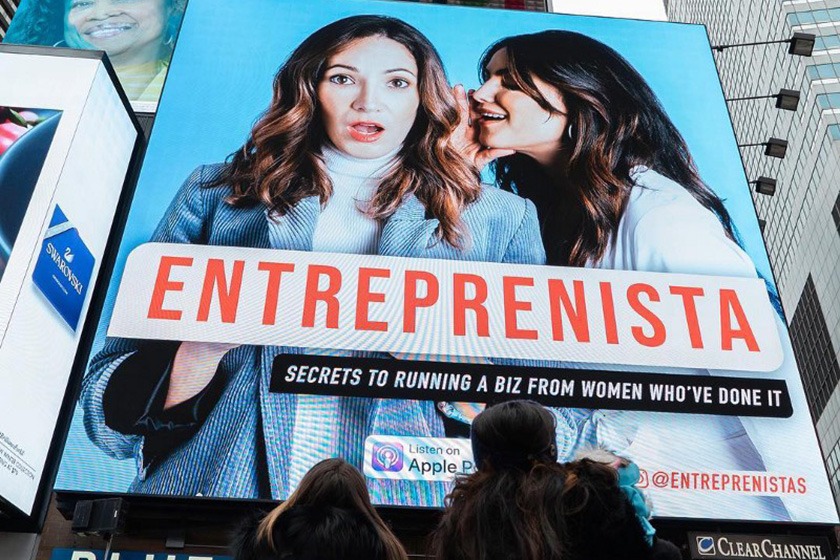 Stephanie Cartin ’06 and Courtney Spritzer on a billboard for their Entreprenista podcast.