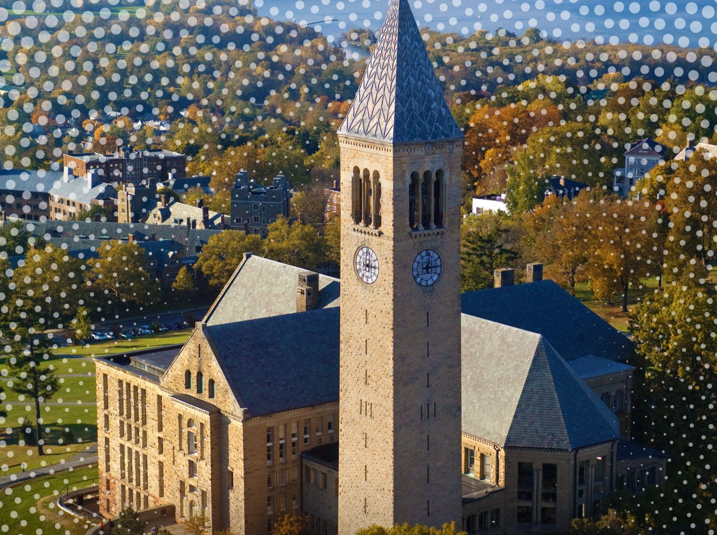 Cornell tower with trees and lake in background