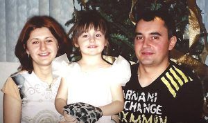 Karina as a toddler, with her mother, Alona Rudeychuk. and father, Oleksiy Popovych