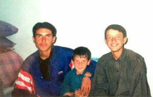 Farid (left) with his brothers, Shafi and Shabir, in 2001