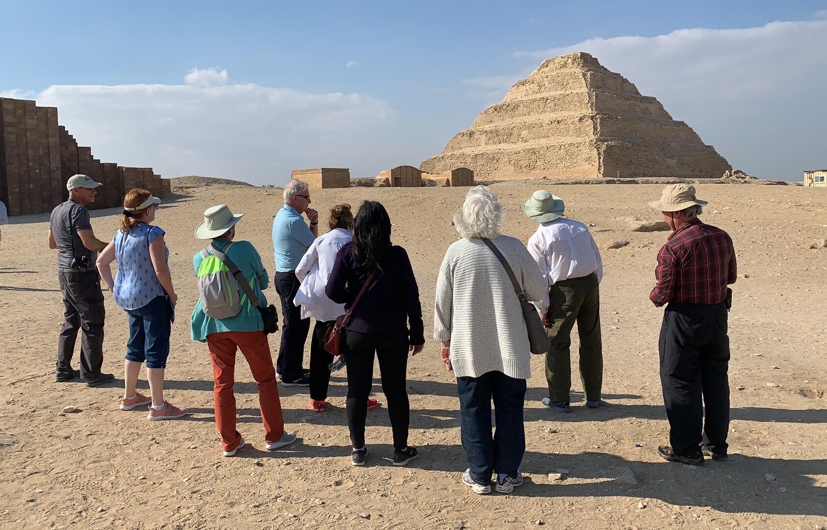 Alumni looking at a pyramid in Egypt