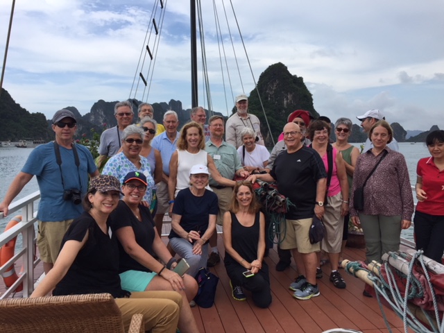 Alumni group photo on a ship